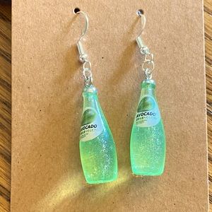 soda earrings with silver looking wires and random gift bag